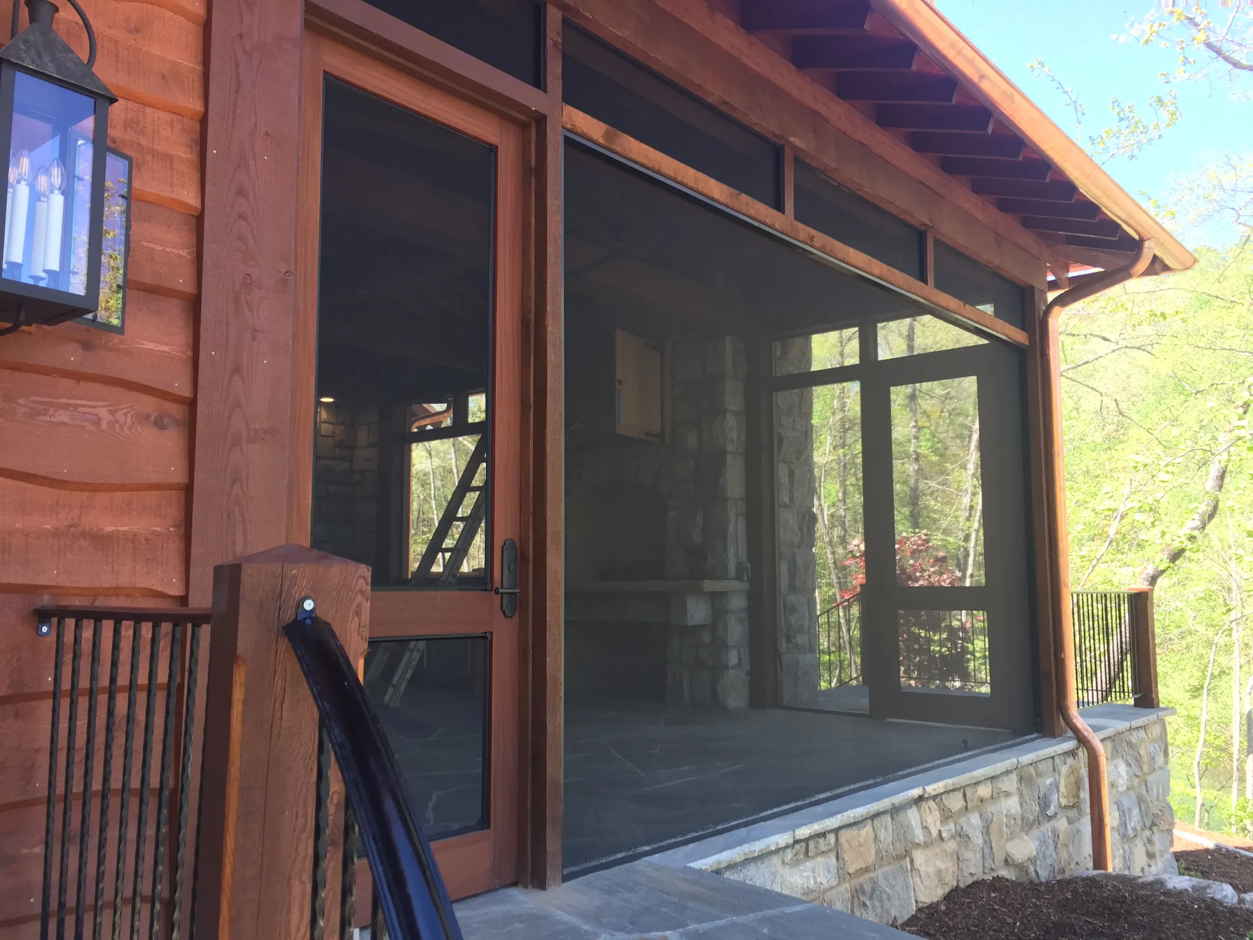 Fixed screens and door on back porch